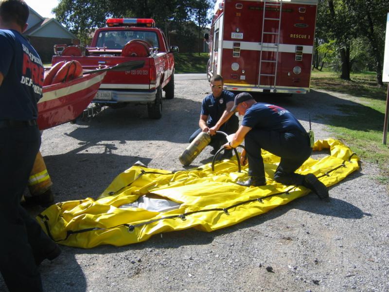 Inflating a rapid deployment boat during training